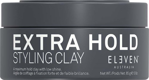 Eine graue Dose Styling Clay mit der Aufschrift "Extra Hold" von ELEVEN Australia für starken, langanhaltenden Halt.
