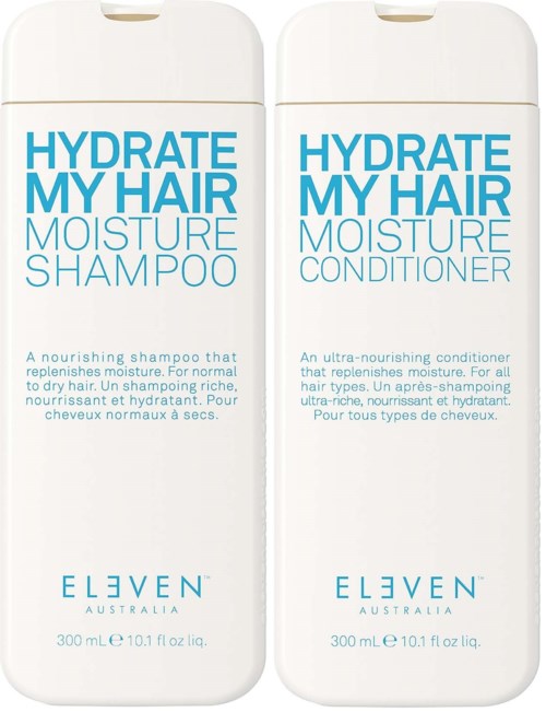 Two bottles of hair care products, one is shampoo and the other is conditioner, both are nourishing and moisturizing.