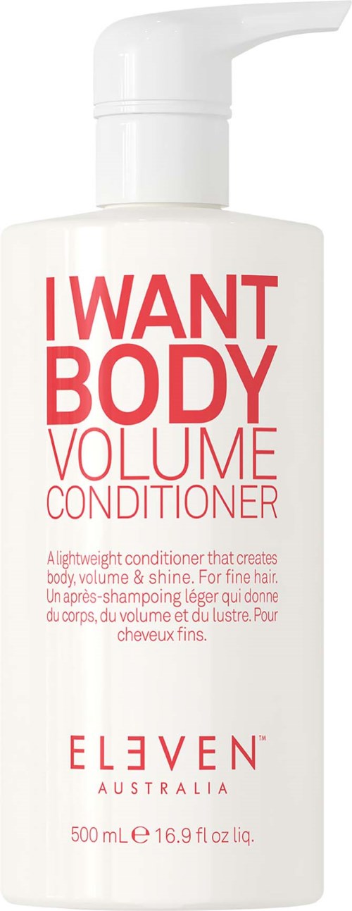 En vit flaska med pump märkt "I WANT BODY VOLUME CONDITIONER" från ELEVEN Australia, 500 ml storlek.