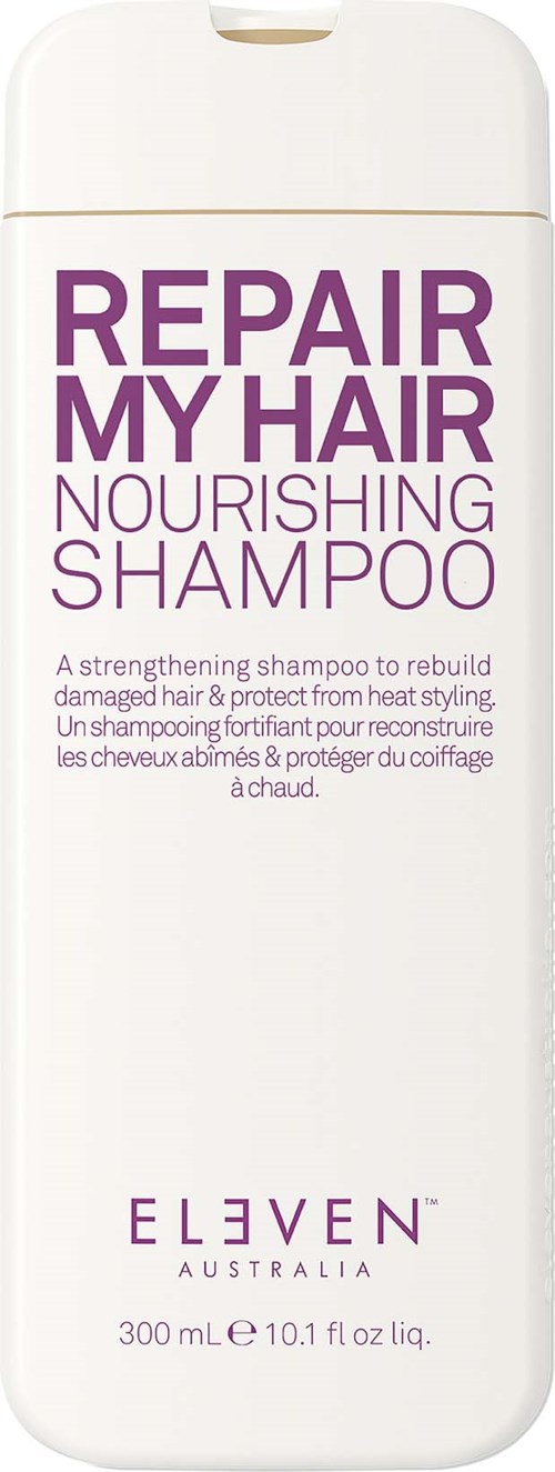 A white shampoo bottle with purple text for repairing and nourishing hair, from brand Eleven Australia, 300 ml.