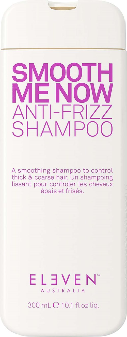 A white bottle of shampoo with purple text mentions smoothing, anti-frizz, and control for thick hair.