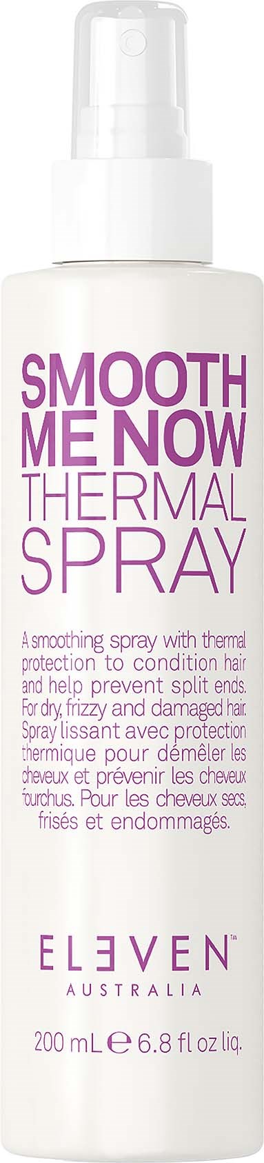 A white thermal spray bottle with pink and purple text for hair care.