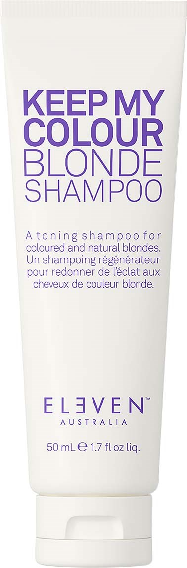 A white bottle of blonde shampoo with purple text, indicating it's for grey and blonde hair. Shows brand and size.