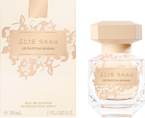 A perfume bottle and box for Elie Saab Le Parfum Bridal. The box is light beige with floral designs, and the bottle is clear with a beige cap.