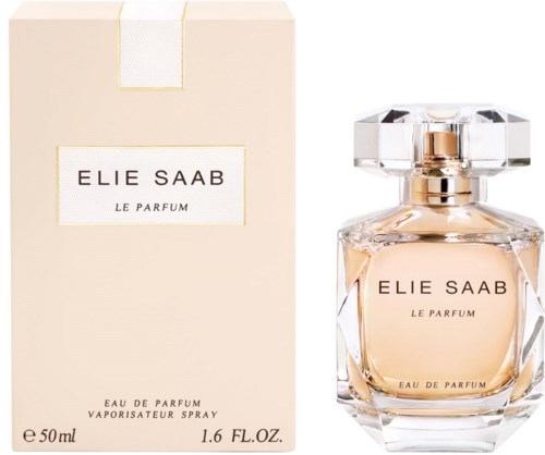 A perfume bottle with a matching box, elegant design, and light pink liquid inside.