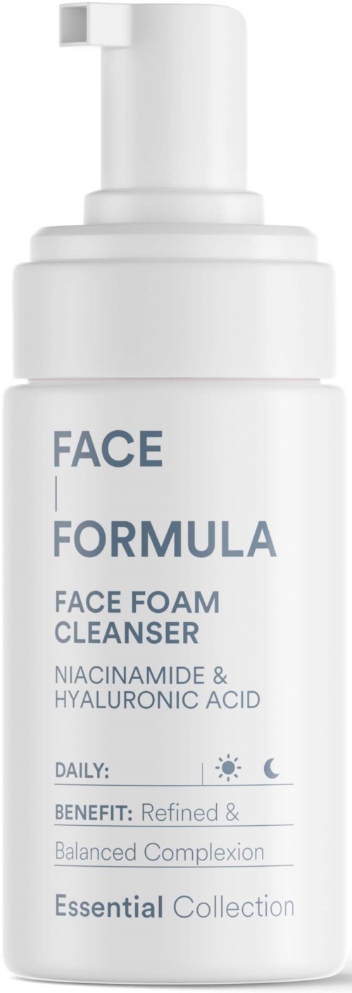 A white bottle with a pump top labeled Face Formula Face Foam Cleanser, containing niacinamide and hyaluronic acid.