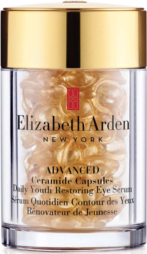 A transparent jar with a gold lid contains beige capsules. The label says Elizabeth Arden, Advanced Ceramide Capsules for eyes.