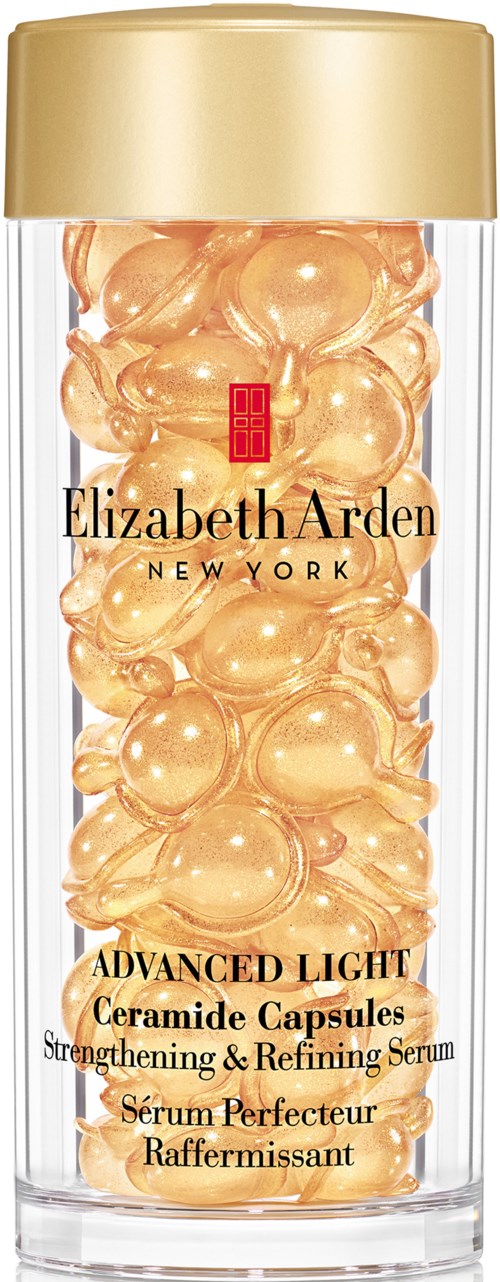 Läpinäkyvä pullo täynnä kultaisia kapseleita, merkitty Elizabeth Arden Advanced Light Ceramide Capsules.
