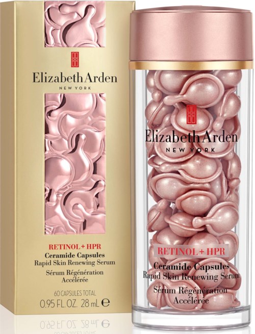 Ihohoitotuote, jossa on vaaleanpunaisia kapselikapseleita läpinäkyvässä pullossa ja kultaisessa laatikossa. Se on Elizabeth Ardenin Retinol+HPR-seerumi.