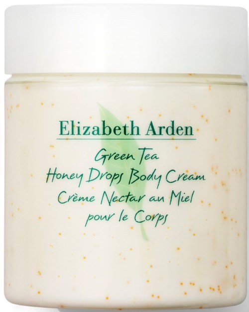 A jar of Elizabeth Arden Honey Drop Body Cream with green tea scent, white container with gold specks.