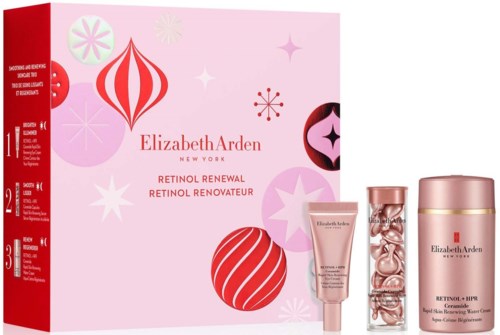 Elizabeth Arden Retinol Renewal skincare set with pink and red packaging, including a cream jar, a tube, and a capsule container.