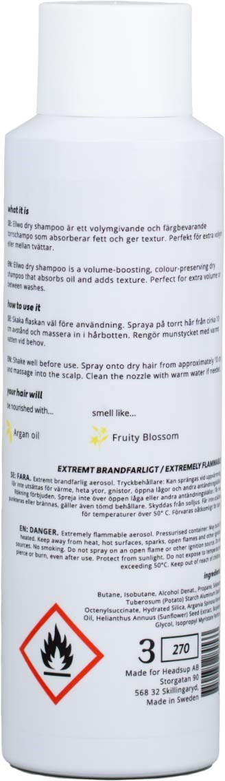 A white bottle with a warning symbol, text, and a red flame icon, likely a hair care or cleaning product.