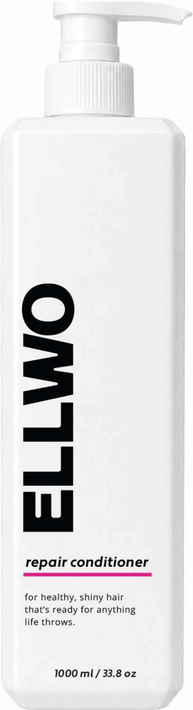 A white bottle of OMLO repair conditioner with a pump top, label showing product name and description for healthy hair.