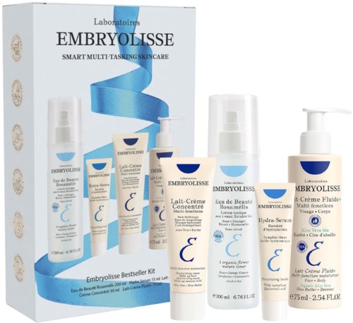 Ett sortiment av Embryolisse hudvårdsprodukter inklusive flaskor och tuber med vitt och blått emballage och produktetiketter.
