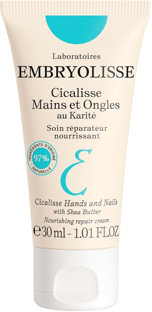 A white tube of Nourishing repair cream for hands and nails with Shea Butter, 30 ml. Label in French and English.