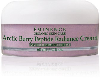 Valkoinen purkki, jossa violetti nauha ja etiketti 'Éminence Arctic Berry Peptide Radiance Cream' kasvojenhoitoon.