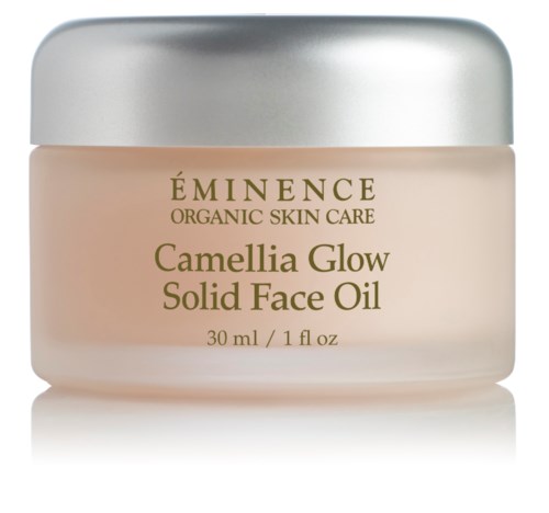 En burk med silverlock innehåller kräm märkta ekologisk hudvård, Camellia Glow Face Oil, 30 ml.