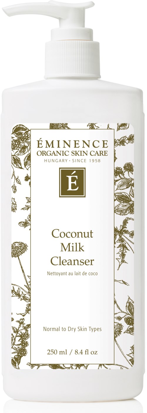 A white bottle with a pump, label says 'ÉMINECE Coconut Milk Cleanser,' for normal to dry skin, 250 ml.