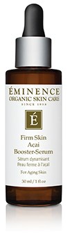 En liten brun flaska med svart lock, märkt 'Éminence' och 'Firm Skin Acai Booster-Serum.'