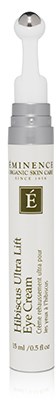 Valkoinen ja harmaa sylinterin muotoinen purkki, nimeltään 'Ultra Lift Eye Cream' Eminence-merkiltä. Logo E-ikoni.
