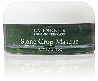 En burk med Eminence Organic Skin Care Stone Crop Masque med grön och vit etikett.