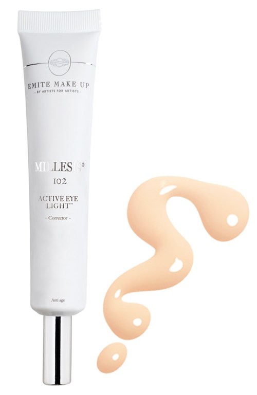 Een witte tube oogcrème met een zilveren dop, en wat beige crème ernaast.