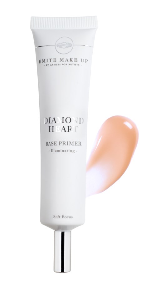 De afbeelding toont een witte tube gezichtsprimer met een zilveren dop en een perzikkleurige hoeveelheid product ernaast.