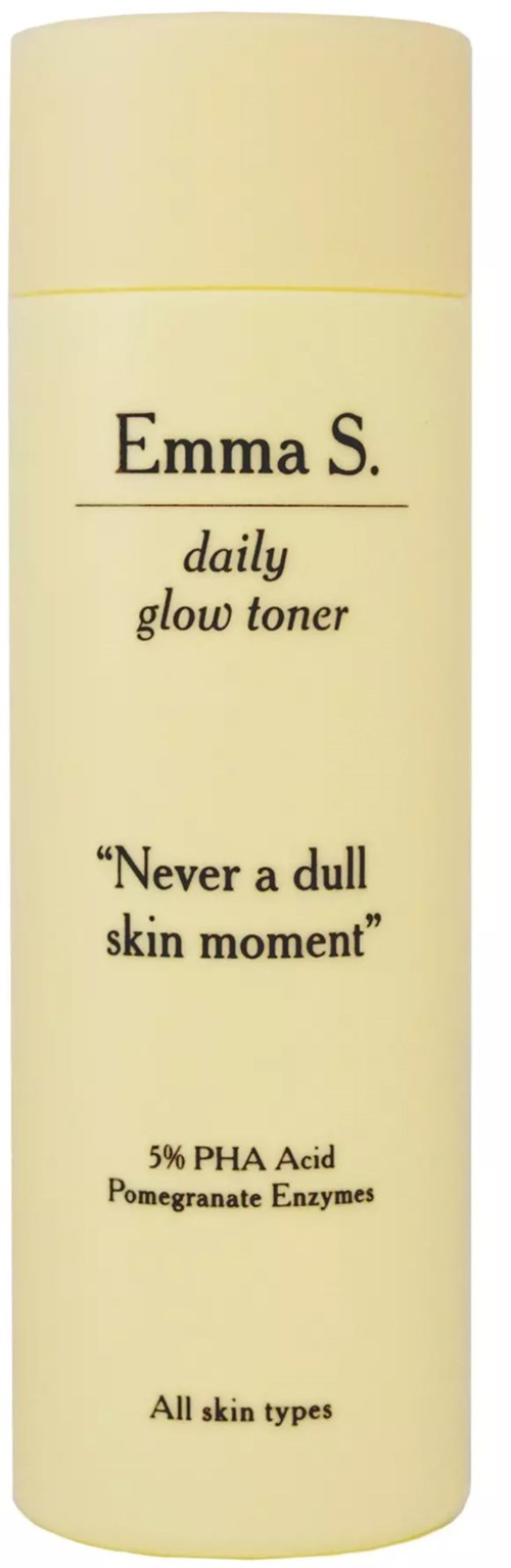 A tall, cream-colored bottle with text about a daily glow toner for all skin types.