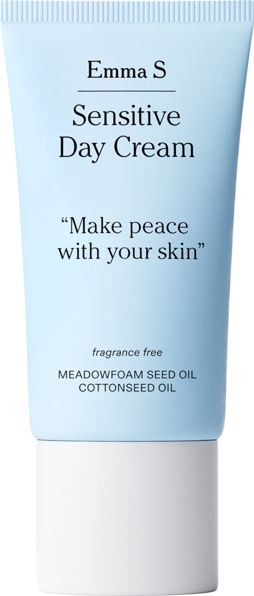 A light blue tube of Emma S Sensitive Day Cream with text and a white cap.