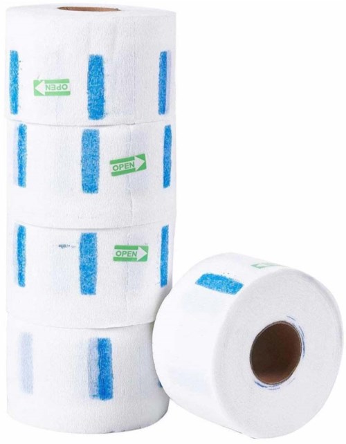 Rolls of medical or sanitary tape with green 'OPEN' arrows and blue markings.