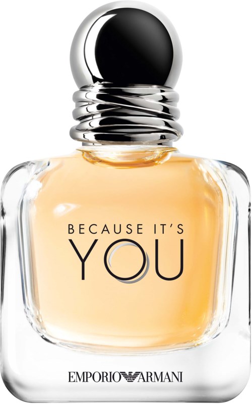 Ein Parfümflasche mit Metallkappe, durchsichtigem Glas und einem Etikett mit "Because it's you" von Emporio Armani.