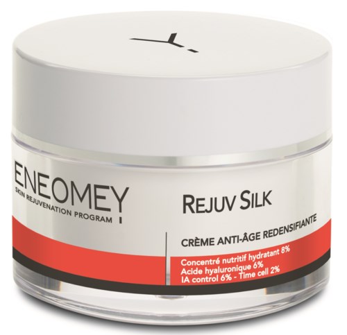 Afbeelding van een witte pot met huidverzorgingscrème getiteld Rejuv Silk, met anti-aging en hydraterende eigenschappen.