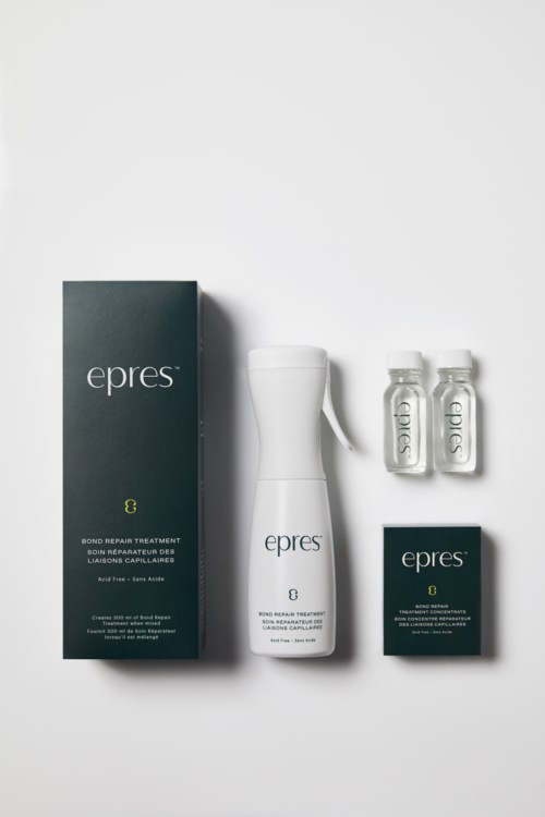 Epres hair repair treatment set includes a box, spray bottle, and two small vials, all with a sleek black and white design.