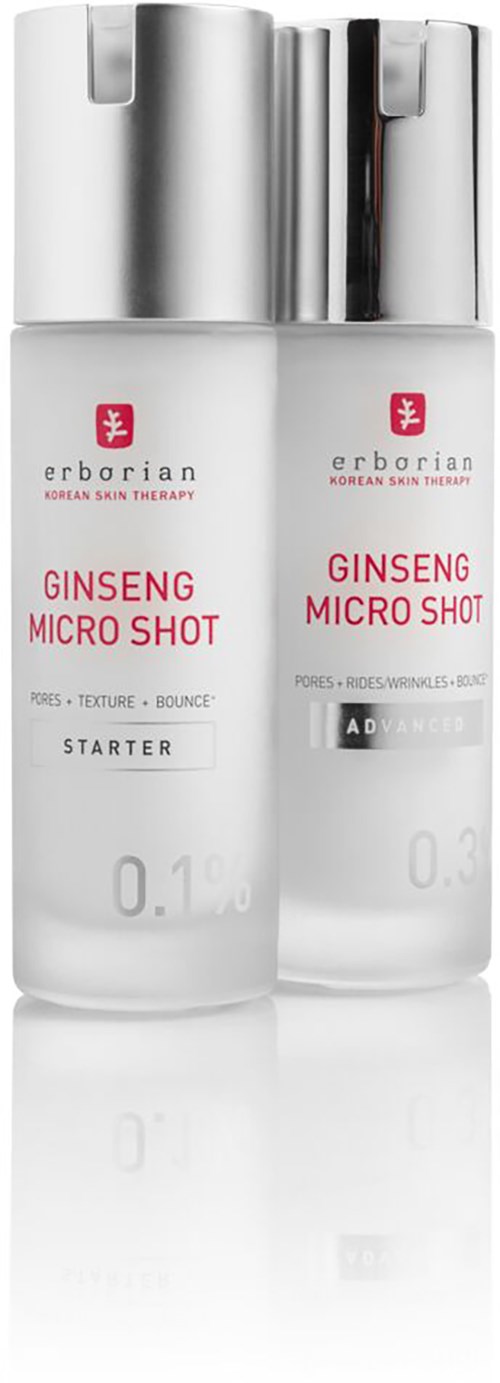 Zwei Flaschen mit Ginseng Micro Shot, eine als Starter, andere als Advanced, mit silbernen Deckeln und weißen Etiketten.