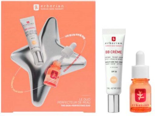 Image of Erborian skincare product set with cream tube and oil bottle on an orange background.
