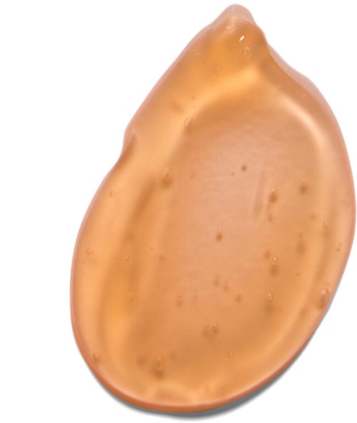 Ein glatter, glänzender, beiger Gegenstand in Tropfenform mit kleinen Flecken auf der Oberfläche.