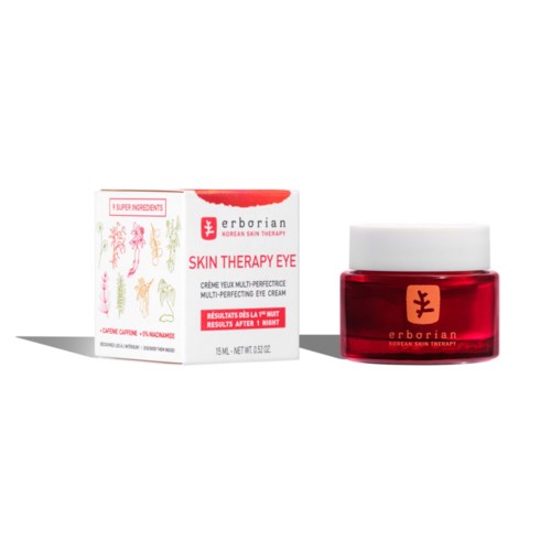 Vihreä silmän hoitopurkki ja laatikko, jossa värikkäitä kasvi-kuvituksia, nimeltään Erborian Skin Therapy Eye.