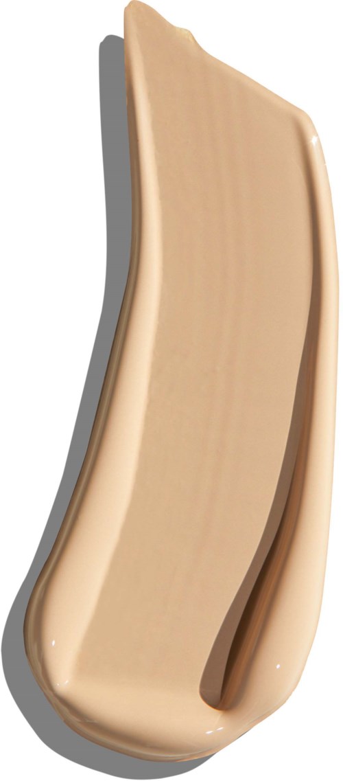 A beige, curved object with a narrow, pointed tip and wider base, resembling a shell or a wooden spoon.