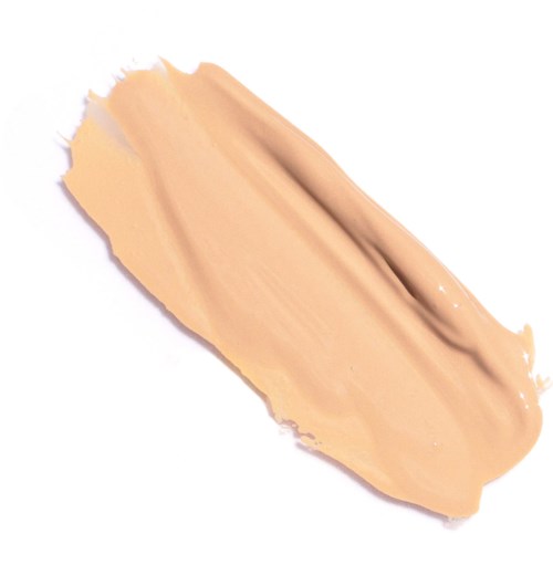 Een beige vloeistof gespreid op een witte ondergrond, mogelijk foundation of lotion.