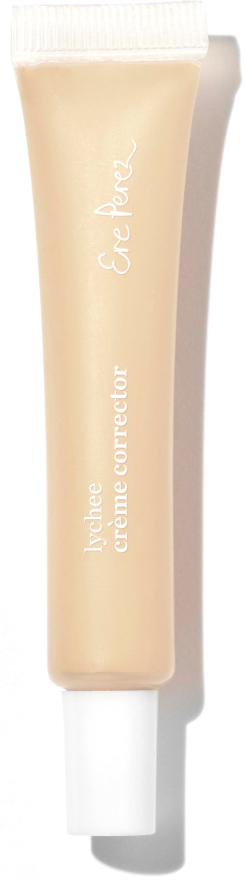 En beige tub med vitt lock märkt 'Eclat Peau' och 'Triple Extreme Corrector' i vitt text.