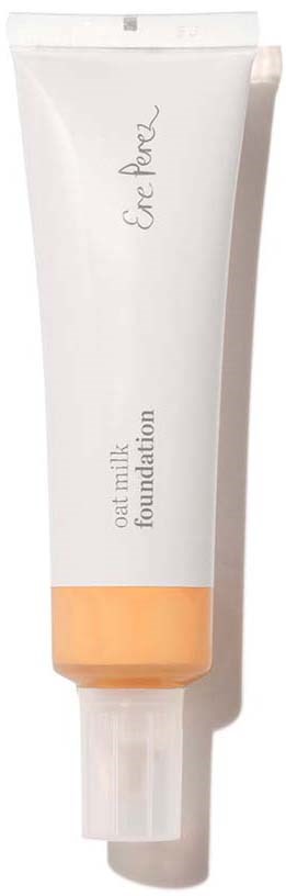 Een witte tube met een beige dop, gemarkeerd met 'Fresh' en 'havermelk foundation'.