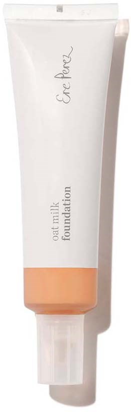 En vit tub med Get Pink havremjölksgrundning med en persikofärgad bas. Inga ytterligare element observerade.