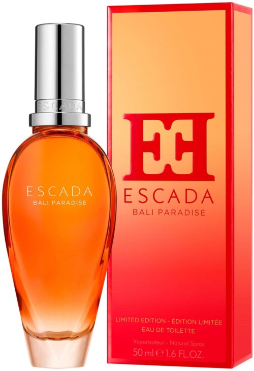 Een parfumflesje met het label Escada Bali Paradise naast een passende doos, beide in warme oranje en rode kleuren.