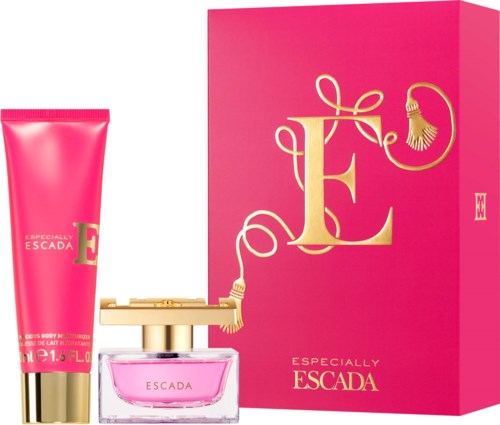 Pink box with a large gold 'E' and a cord design, and two Escada perfume items: a tube and a bottle.