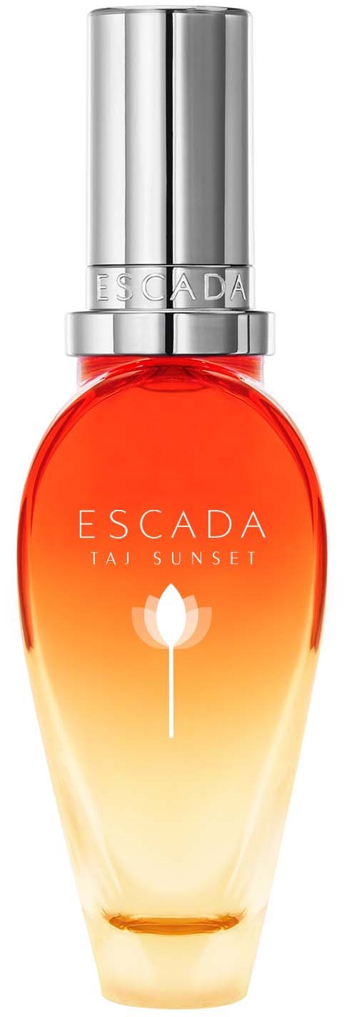 En Parfymeflaske med sølvhette og oransje til gulaktig væske, merket Esada Tai Sunset, med en hvit blomsterlogo.