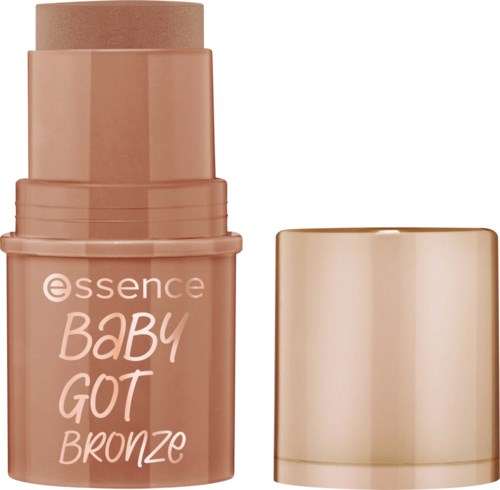 Een beige foundationstift met goudkleurige deksel, gemerkt Essence Baby Got Bronze, voor make-up.