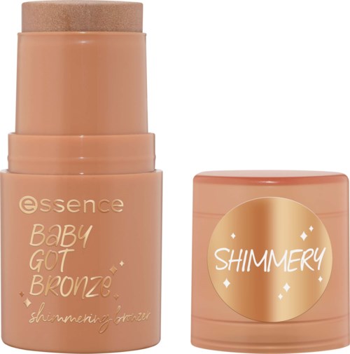 Ein bronzefarbiges Make-up-Produkt mit Deckel, beschriftet Baby Got Bronze und Shimmery. Es sieht wie ein Bronzer aus.