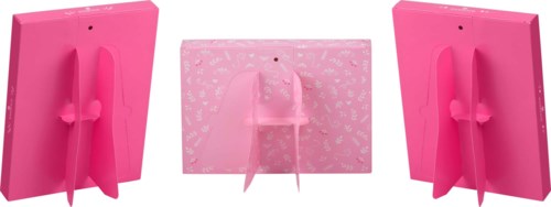 Three pink cardboard display stands with slots for makeup or beauty products, shown from the back.
