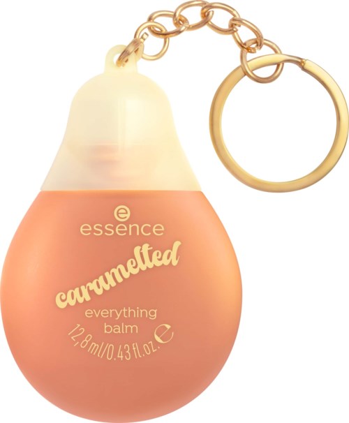 Karamellinvärinen Essence everything balm tippa-ampullissa, jossa on avaimenperä ja kultaiset yksityiskohdat.