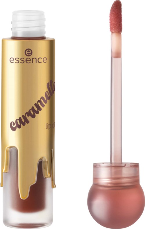 Lusikkaglansi vaaleanpunaisella sävyllä ja selkeällä pyöreällä säiliöllä, vieressä Essence caramel lip gloss -putki.